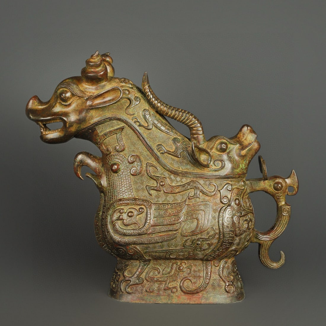 An Exquisite Chinese Bronze Beast Gong: Size: Height 41 cm - Width 45 cm Materials: Bronze Dynasty: zhou dynasty Attribution: 700-BC Object: Bell