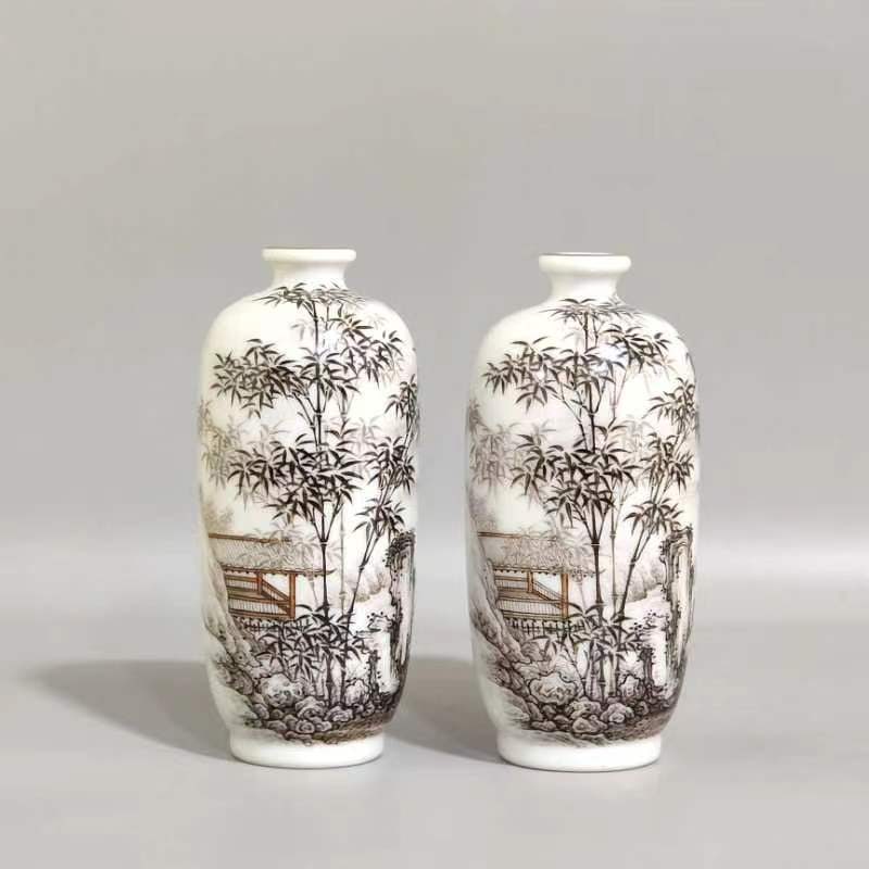 An Exquisite Chinese inkAnd bamboo crane snuff bottle: Size: Height 9.8 cm - Width 4.5 cm Materials: Porcelain Dynasty: Qing dynasty Inscription: Qianlong Mark Object: bottle