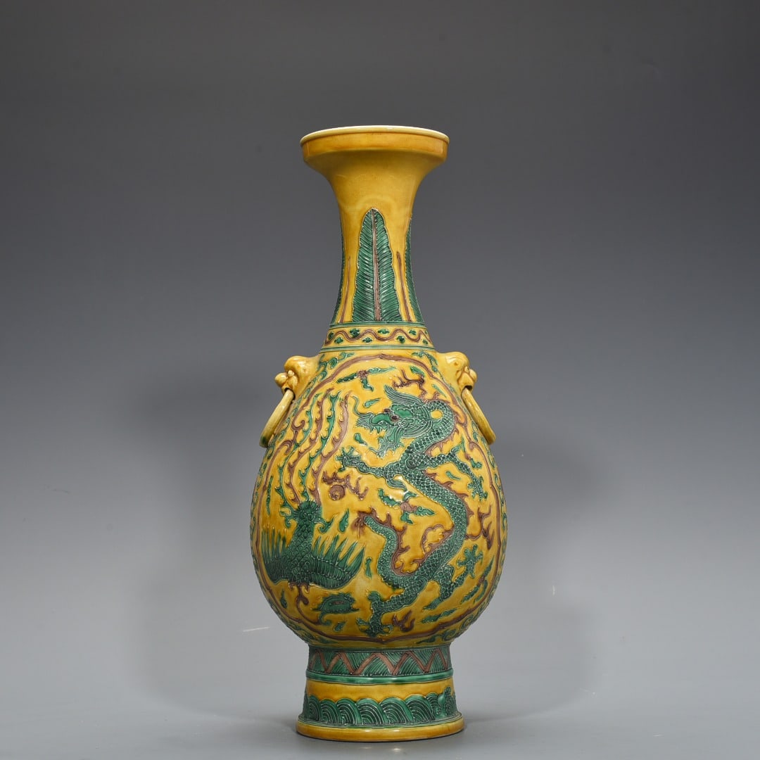 An Exquisite Chinese yellow ground enamel disc-mouth vase: Size: Height 42 cm - Widthh 23 cm Materials: Porcelain Dynasty: Ming Dynasty Attribution: Jiajing Mark Object: vase