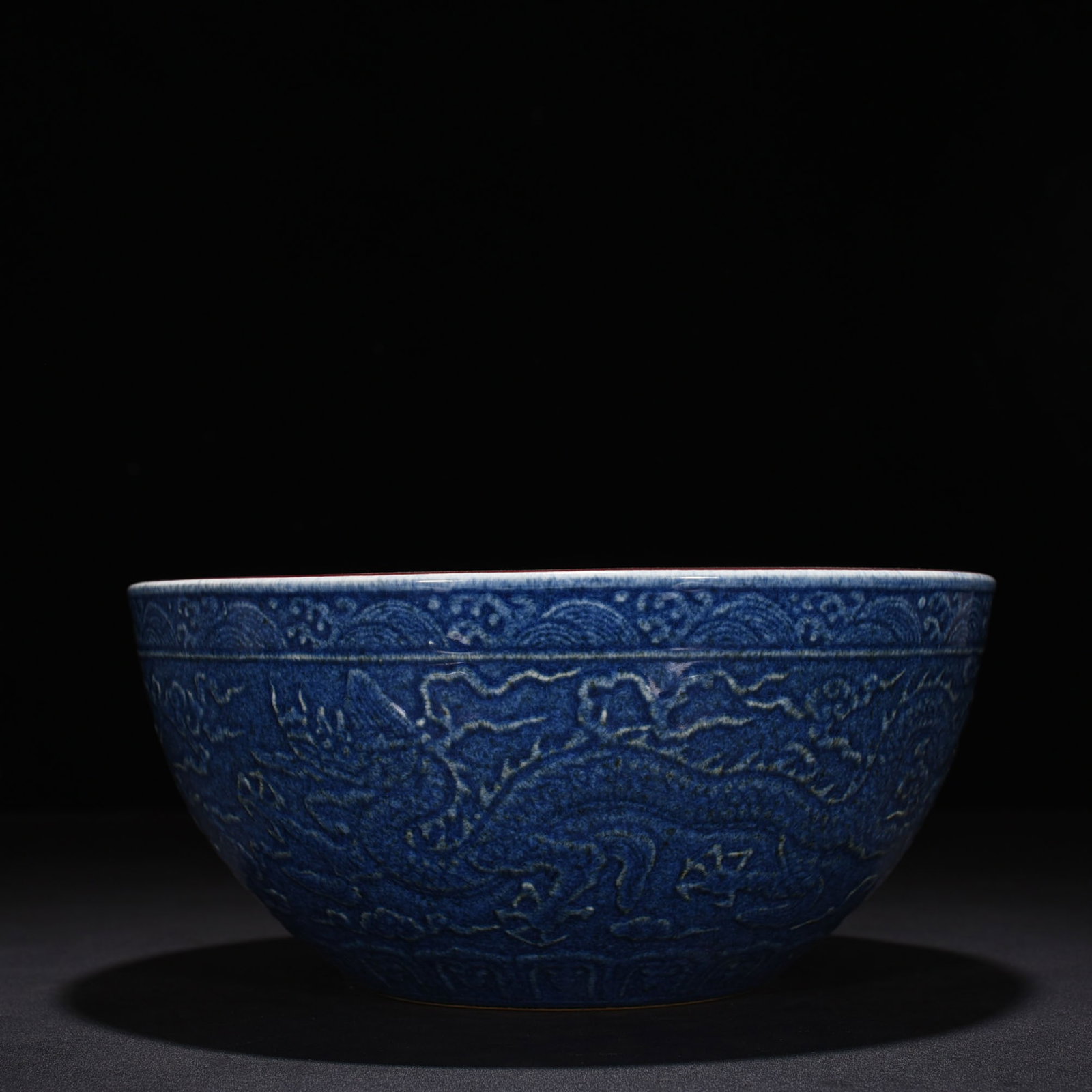 An Exquisite Chinese blue-glazed red-carved bowl: Size: Height 13 cm - Widthh 27 cm Materials: Porcelain Dynasty: Ming Dynasty Attribution: Xuande Mark Object: bowl