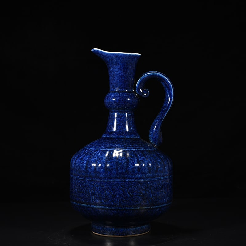 An Exquisite Chinese blue glaze flower pouring vase: Size: Height 31 cm - Widthh 18 cm Materials: Porcelain Dynasty: Ming Dynasty Attribution: Xuande Mark Object: vase