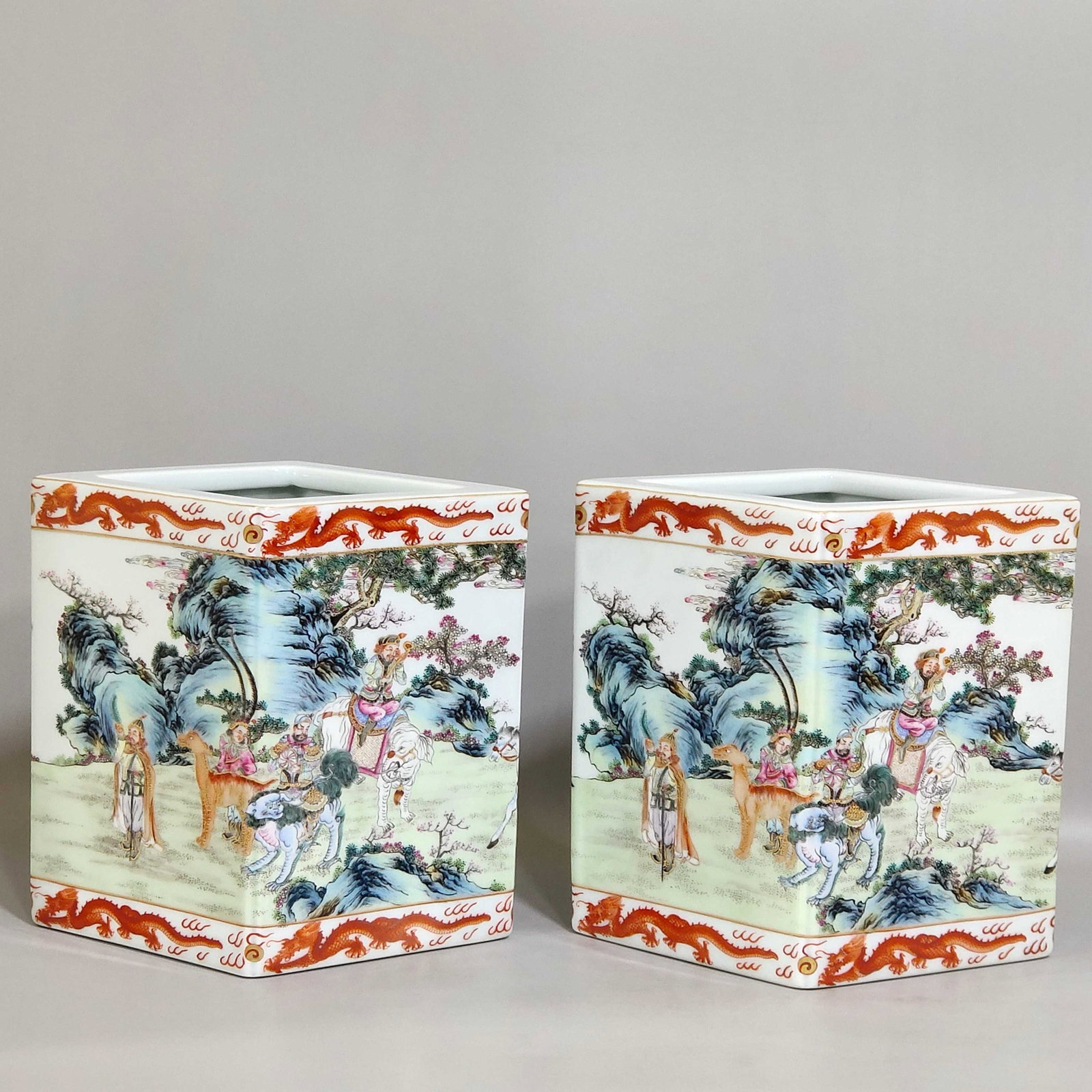 An Exquisite Chinese Gong red dragon pattern square prismatic pen holder with eight barbarians: Size: Height 17.5 cm - Width 16 cm Materials: Porcelain Dynasty: Qing dynasty Inscription: Qianlong Mark Object: pen holer