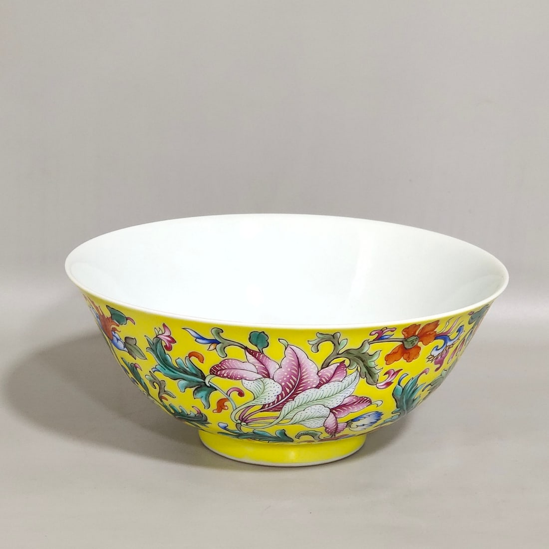 An Exquisite Chinese imperial kiln lemon yellow porcelain body painted enamel foreign flower palace: Size: Width 14.7 cm - Height 6.3 cm Materials: Porcelain Dynasty: Qing dynasty Inscription: Qianlong Mark Object: bowl