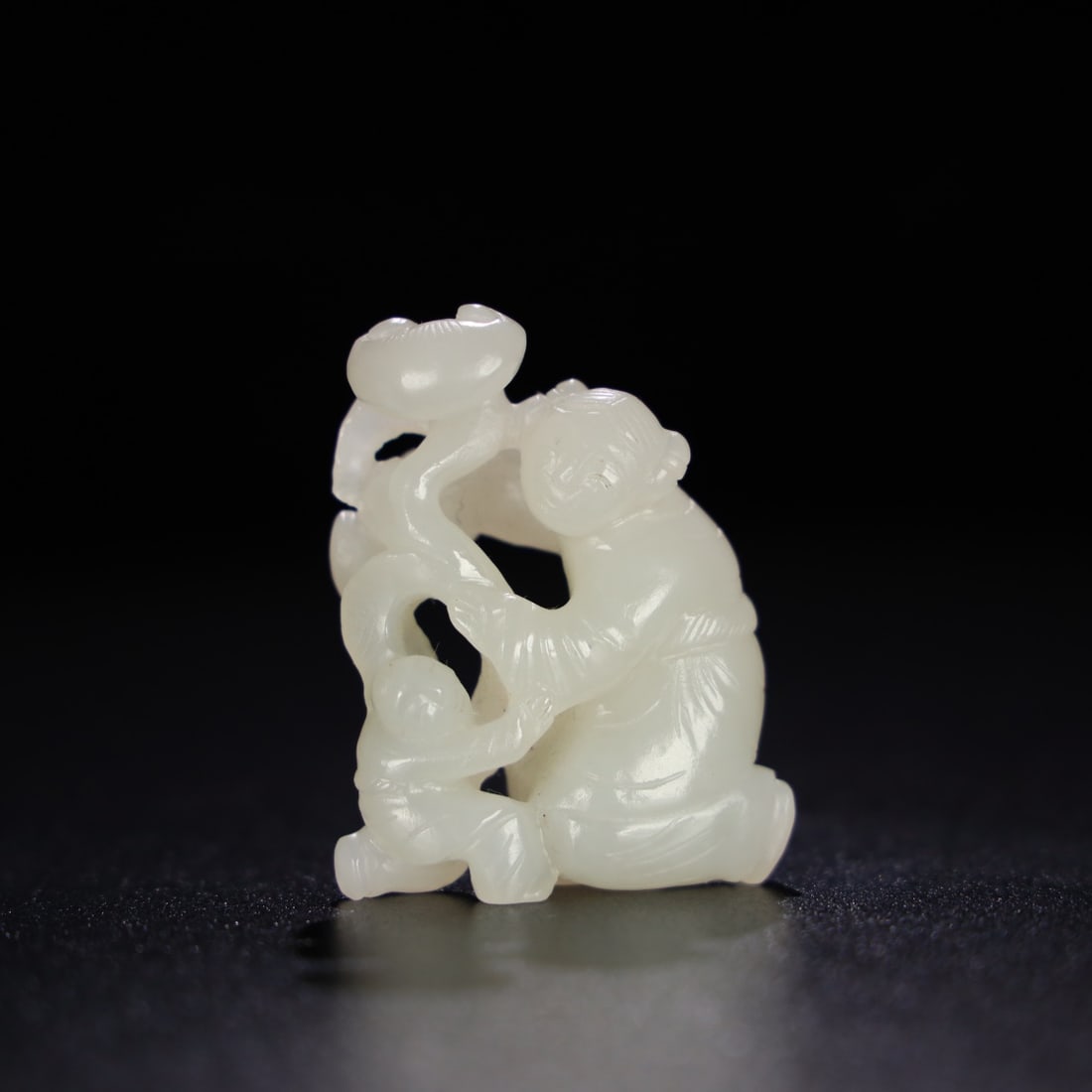An Exquisite Chinese Natural Jade Carved Boy Statue: Size: Height 5.3 cm - Width 4.3 cm Materials: Jade Dynasty: Qing dynasty Attribution: Qianlong Period Object: Boy Statue