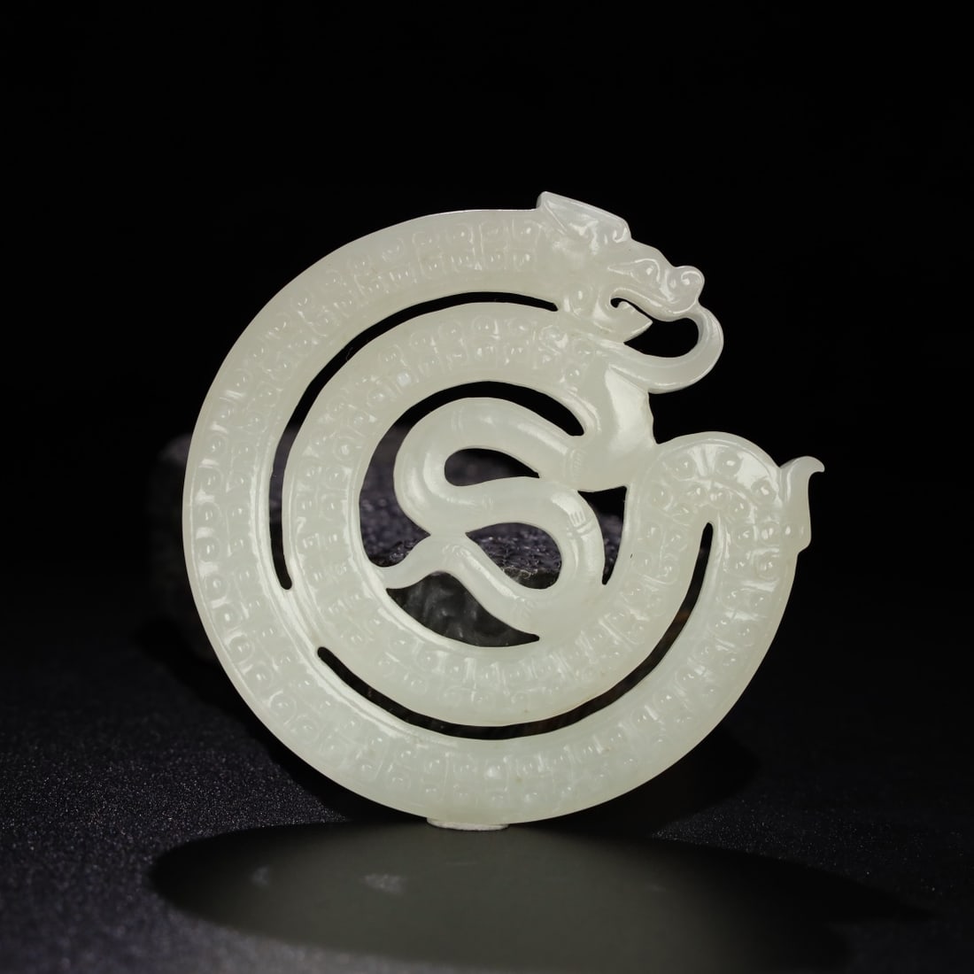 An Exquisite Chinese Natural Jade Carved Dragon Pendant: Size: Width 8.6 cm - Height 0.8 cm Materials: Jade Dynasty: Qing dynasty Attribution: Qianlong Period Object: Dragon Pendant