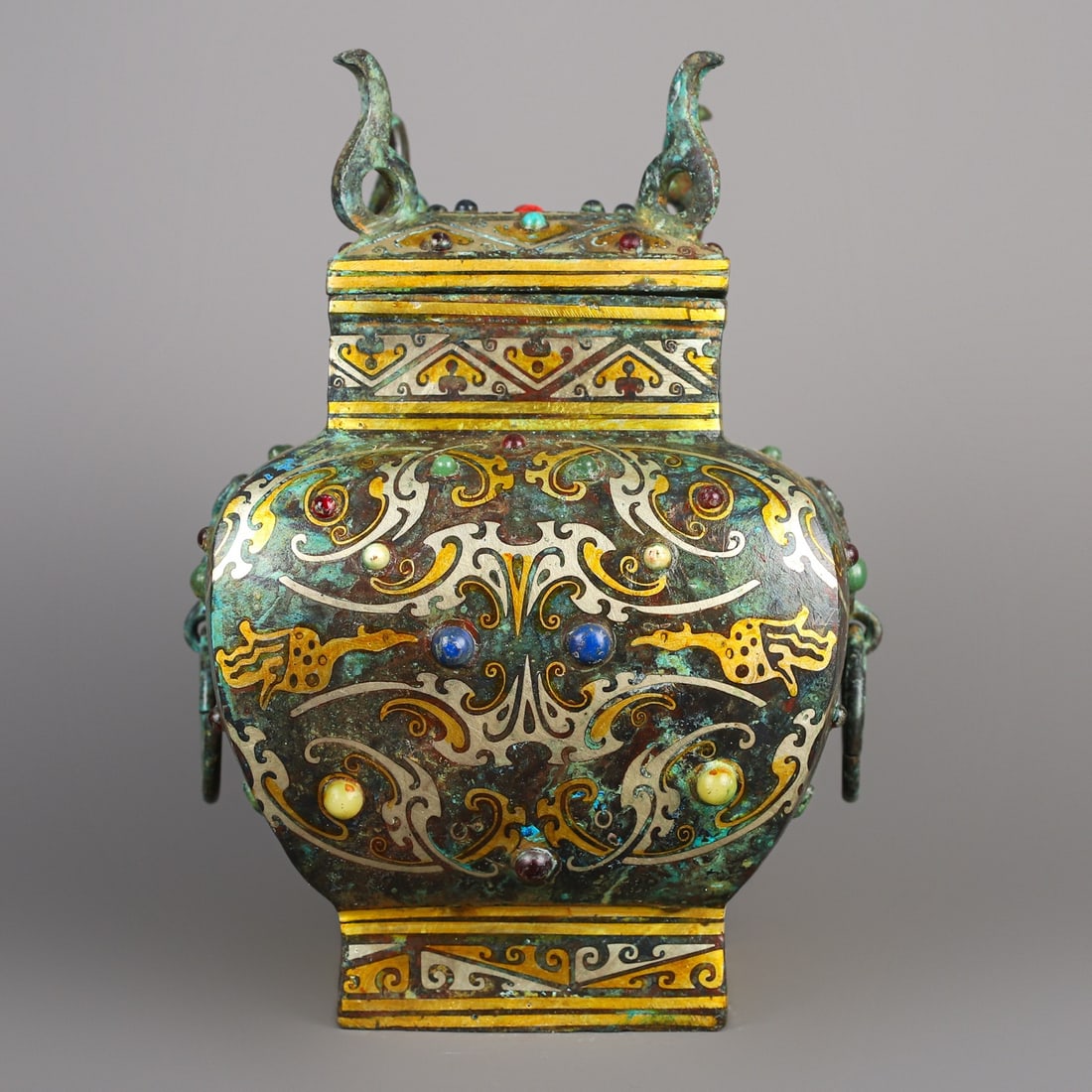 An Exquisite Chinese Bronze and gold inlaid square vase: Size: Height 21 cm - Width 16 cm Materials: Bronze Dynasty: Han dynasty Attribution: 1st to 3rd-C Object: Bell