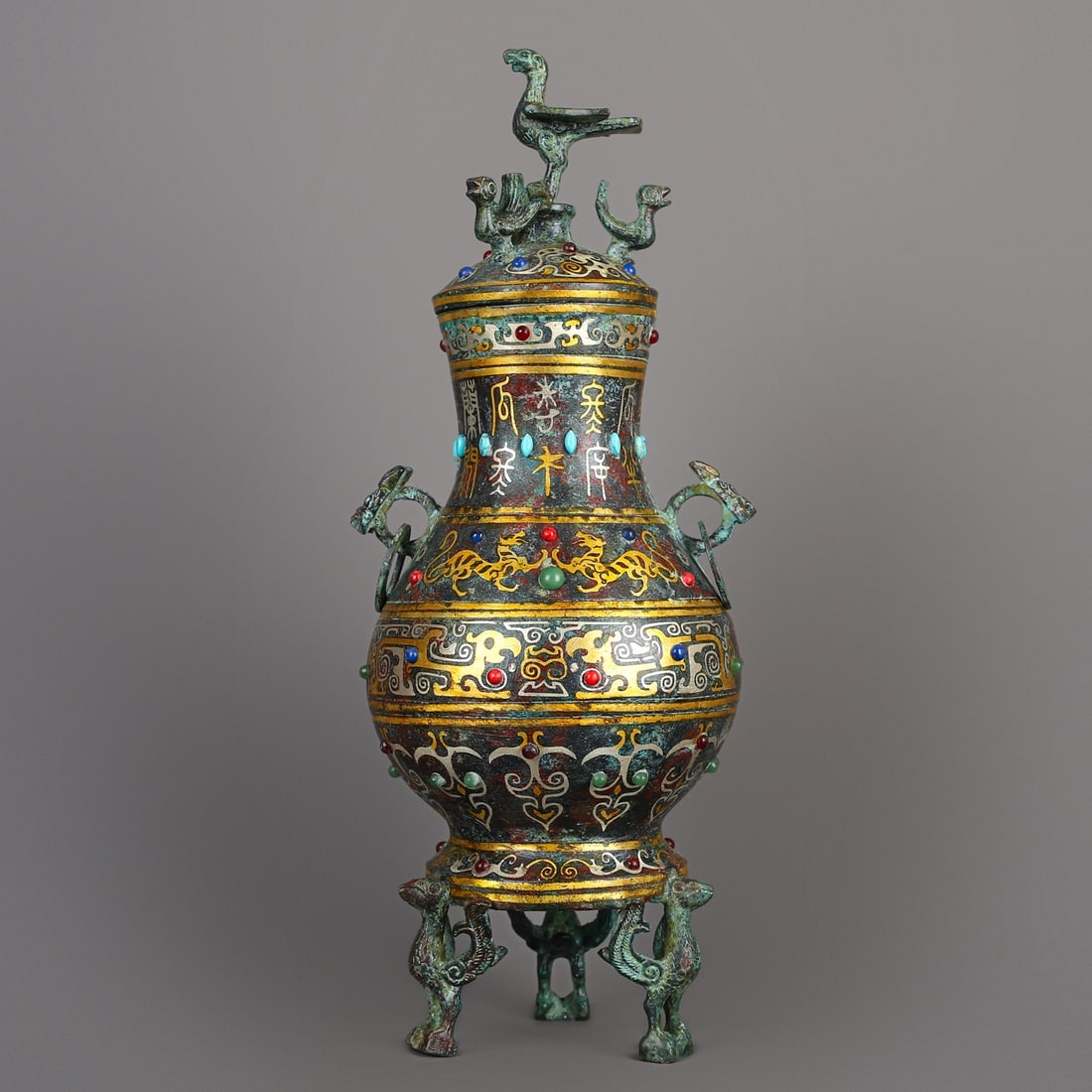 An Exquisite Chinese Bronze and gold inlaid standing bird vase: Size: Height 35 cm - Width 14 cm Materials: Bronze Dynasty: Han dynasty Attribution: 1st to 3rd-C Object: Bell