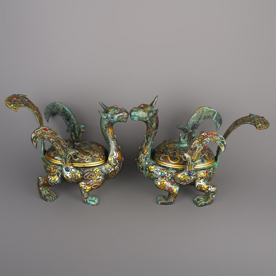 An Exquisite Chinese A pair of bronze and gold inlaid beast statues: Size: Height 18.5 cm - Width 12 cm Materials: Bronze Dynasty: Han dynasty Attribution: 1st to 3rd-C Object: Bell