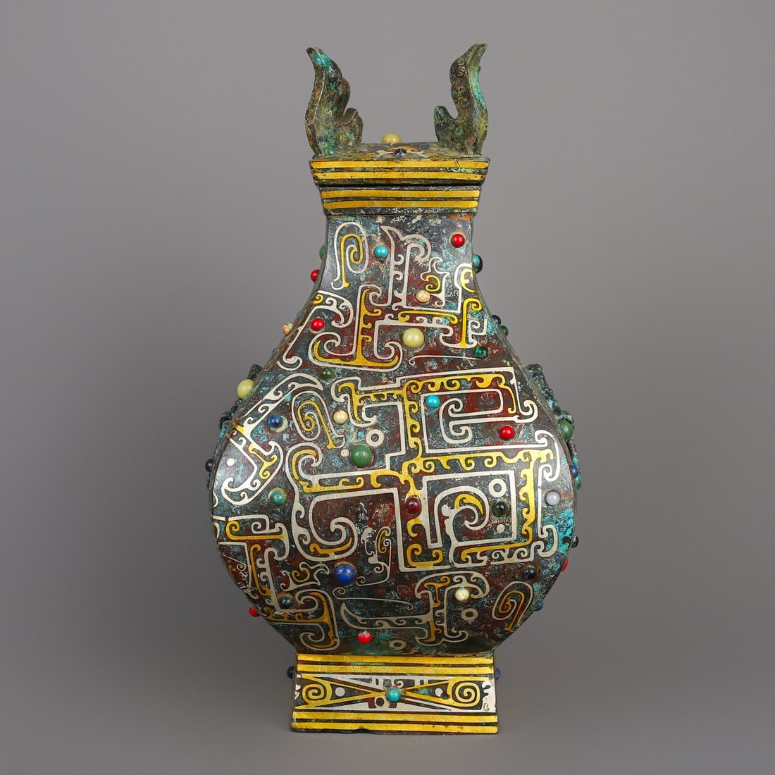 An Exquisite Chinese Bronze and gold inlaid square vase: Size: Height 27 cm - Width 14 cm Materials: Bronze Dynasty: Han dynasty Attribution: 1st to 3rd-C Object: Bell