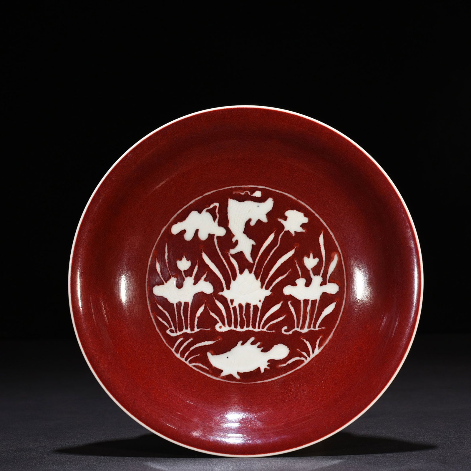 An Exquisite Chinese red glaze engraved dish (1 of 6)