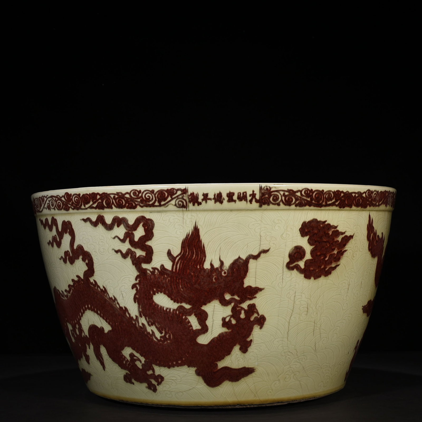 An Exquisite Chinese underglaze red vat with sea water: Size: Height 35 cm - Widthh 65 cm Materials: Porcelain Dynasty: Ming Dynasty Attribution: Xuande Mark Object: vat