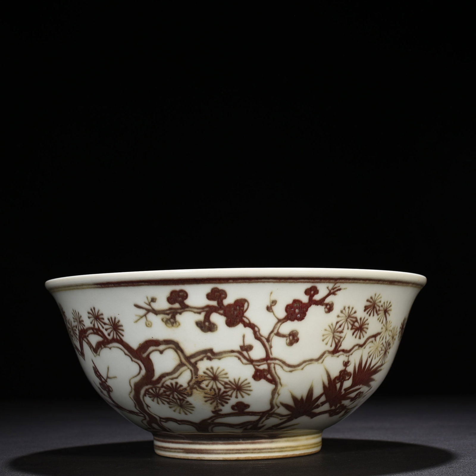 An Exquisite Chinese underglaze red pine bambooAnd plum bowl: Size: Height 12 cm - Widthh 27 cm Materials: Porcelain Dynasty: Ming Dynasty Attribution: Xuande Mark Object: bowl