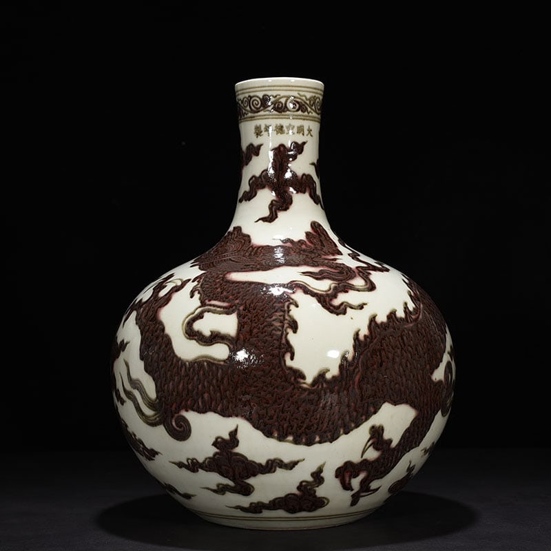 An Exquisite Chinese underglaze red celestial sphere vase: Size: Height 43 cm - Widthh 29 cm Materials: Porcelain Dynasty: Ming Dynasty Attribution: Xuande Mark Object: vase