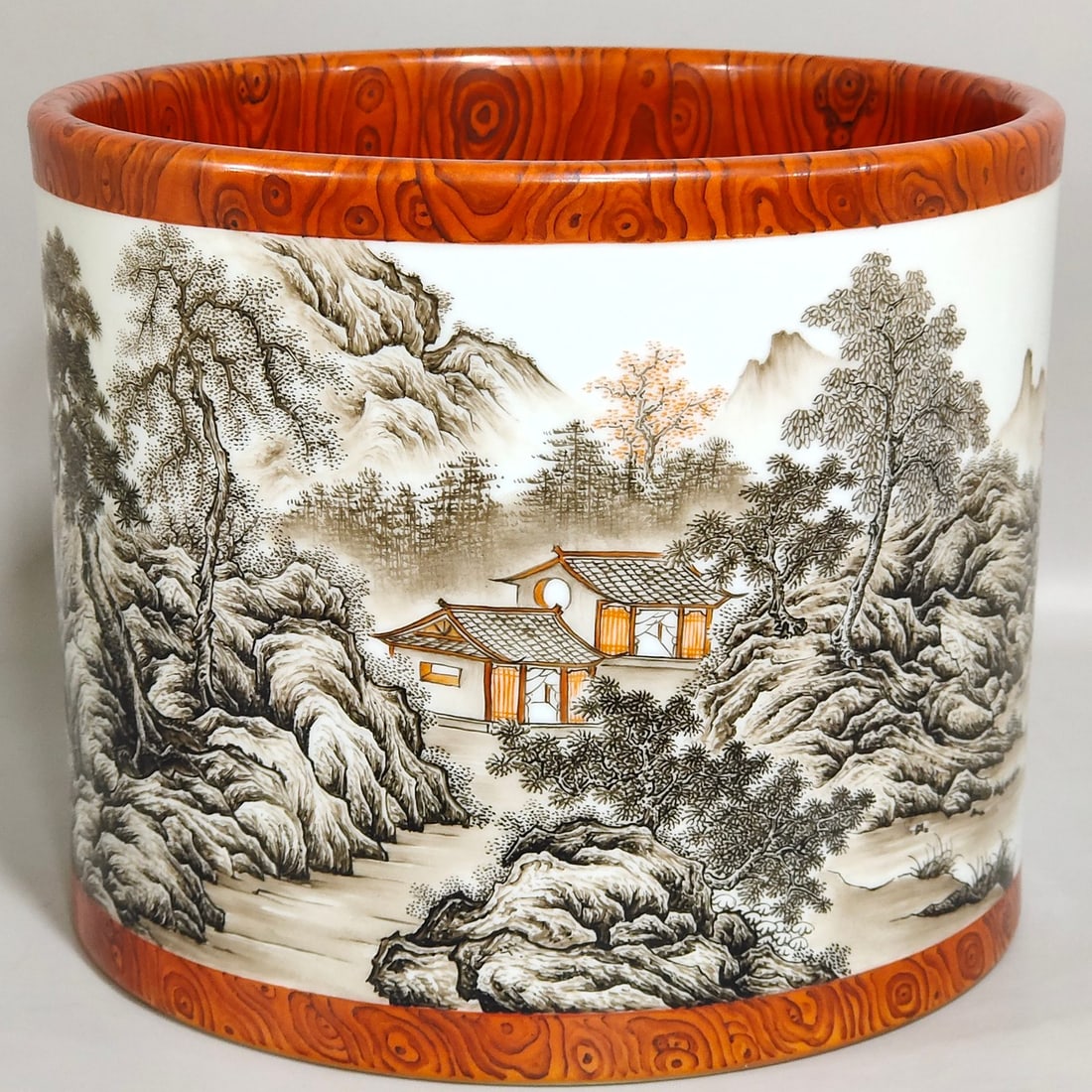 An Exquisite Chinese wood grain glazed landscape pen holder: Size: Width 19.5 cm - Height 16.2 cm Materials: Porcelain Dynasty: Qing dynasty Inscription: Qianlong Mark Object: bucket