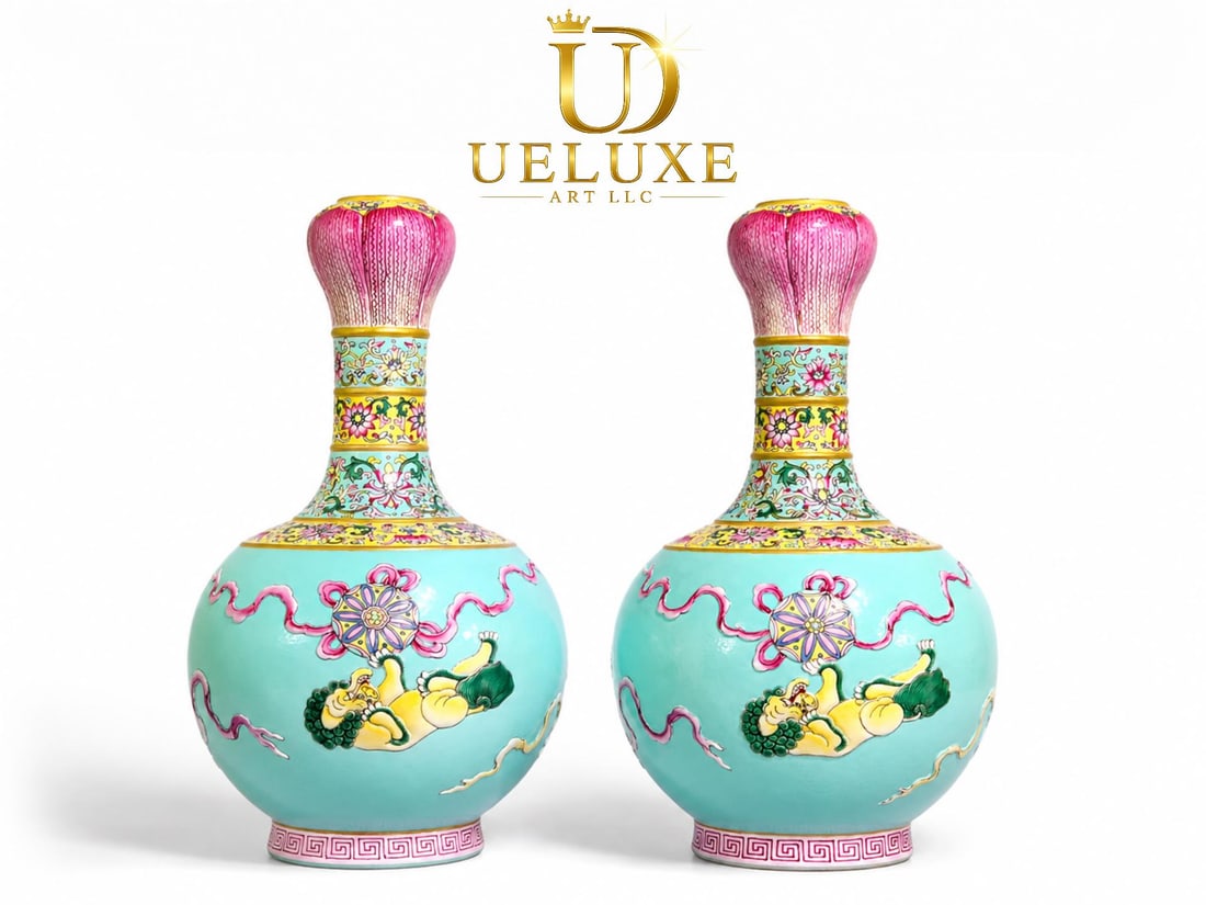 An Exquisite Chinese turquoise green relief garlic vase: Size: Height 28 cm - Width 16 cm Materials: Porcelain Dynasty: Qing dynasty Inscription: Qianlong Mark Object: vase