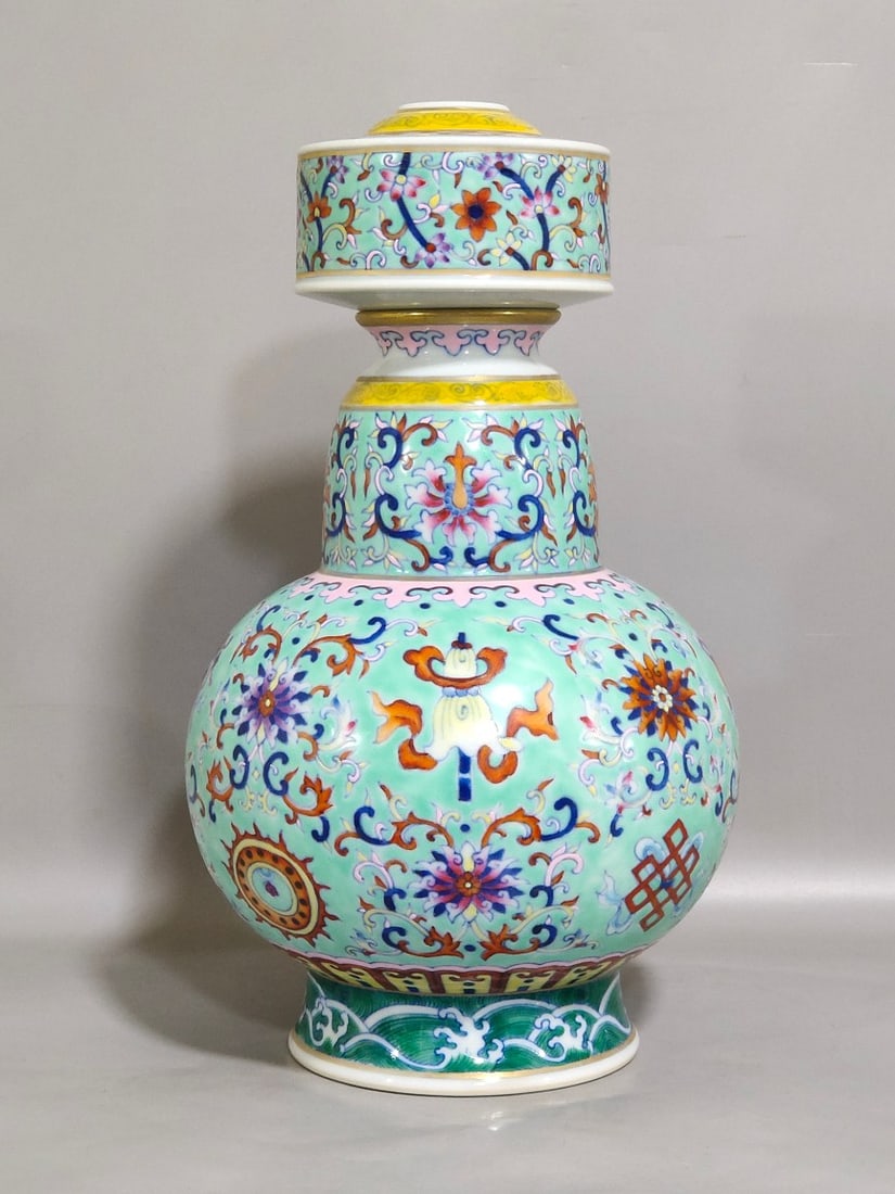 An Exquisite Chinese turquoise green eight-treasure spray bottle: Size: Height 27.5 cm - Width 15.5 cm Materials: Porcelain Dynasty: Qing dynasty Inscription: Qianlong Mark Object: bottle