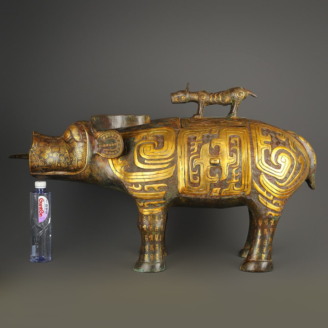 An Exquisite Chinese Bronze and gold bull statue: Size: Height 53 cm - Width 92 cm Materials: Bronze Dynasty: Han dynasty Attribution: 1st to 3rd-C Object: Bell