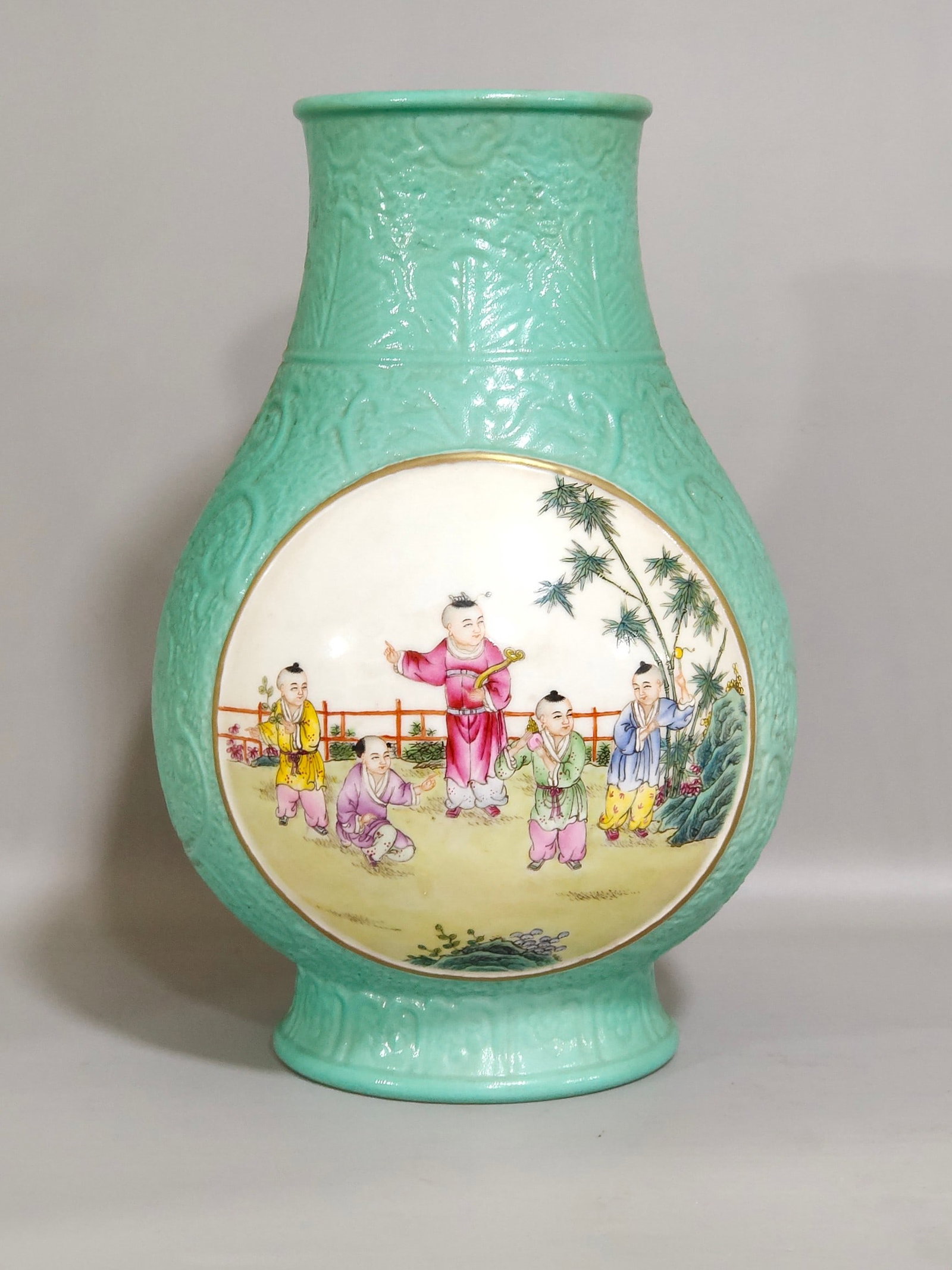 An Exquisite Chinese turquoise green carved window vase: Size: Height 25.5 cm - Width 16 cm Materials: Porcelain Dynasty: Qing dynasty Inscription: Qianlong Mark Object: vase