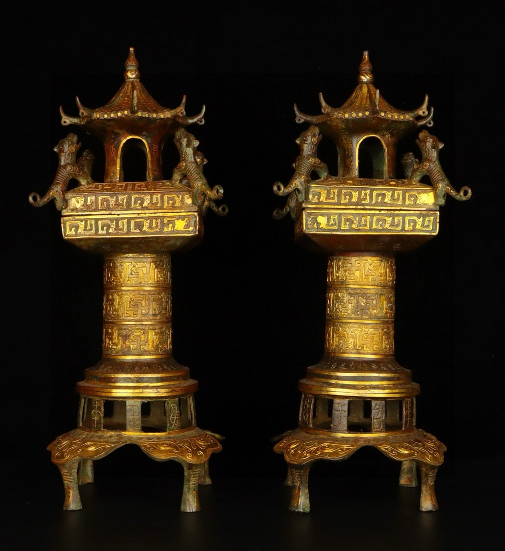 An Exquisite Chinese Pair of Bronze and Gold Palace Lanterns: Size: Height 54 cm - Width 21 cm Materials: Bronze Dynasty: Han dynasty Attribution: 1st to 3rd-C Object: Bell