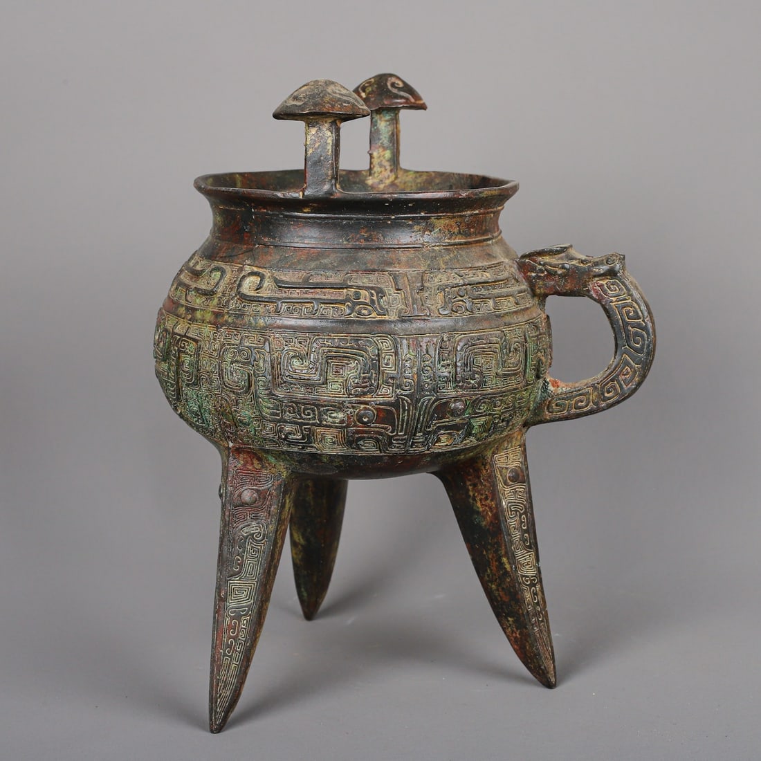 An Exquisite Chinese Bronze Tripod: Size: Height 25 cm - Width 16 cm Materials: Bronze Dynasty: zhou dynasty Attribution: 700-BC Object: Bell