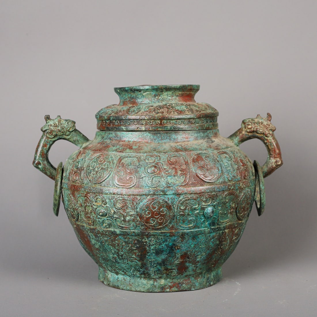 An Exquisite Chinese Bronze Double Dragon Ear Round Rei Jar (1 of 9)