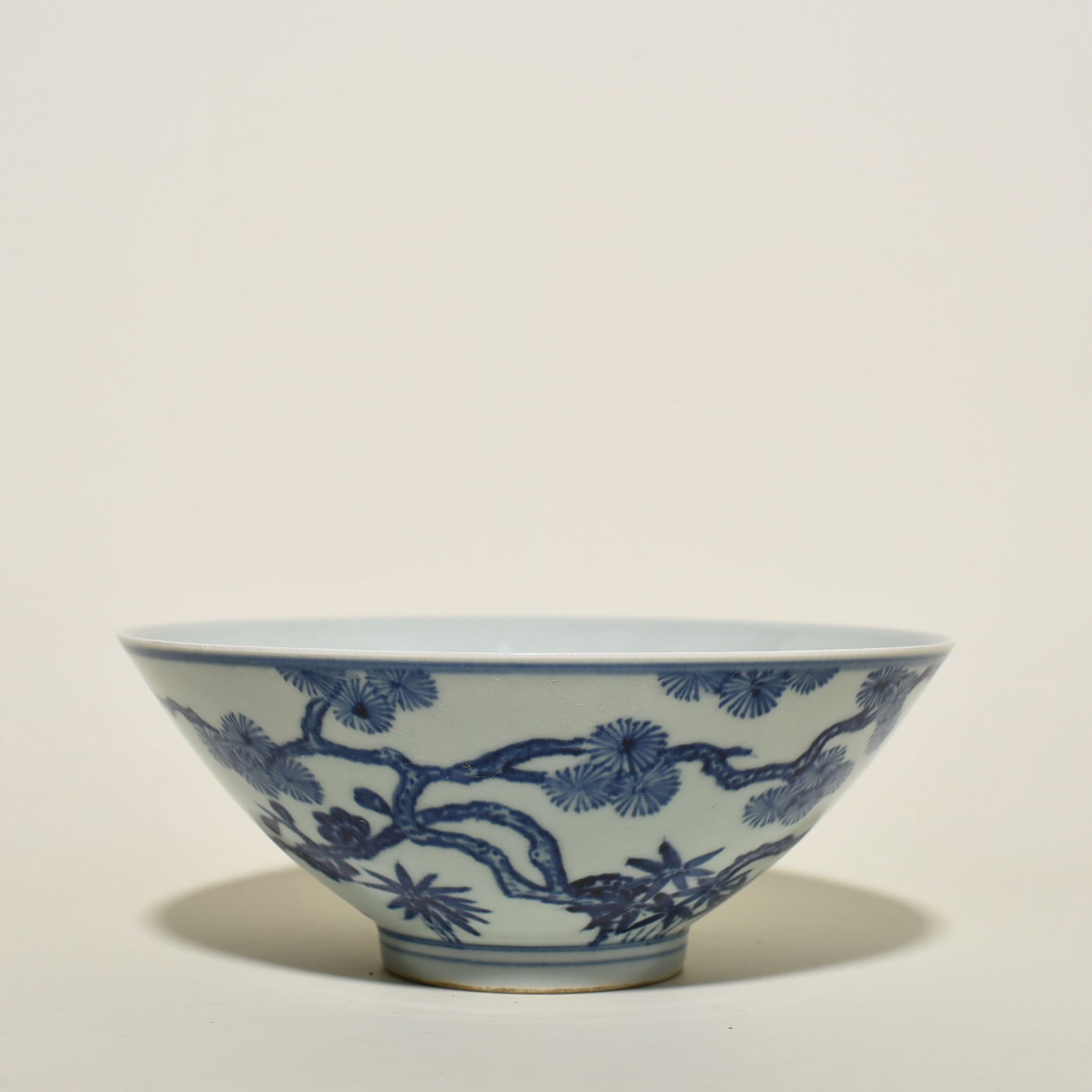 An Exquisite Chinese blueAnd white pine bambooAnd plum hat bowl: Size: Height 9 cm - Widthh 21 cm Materials: Porcelain Dynasty: Ming dynasty Attribution: Xuande Object: bowl