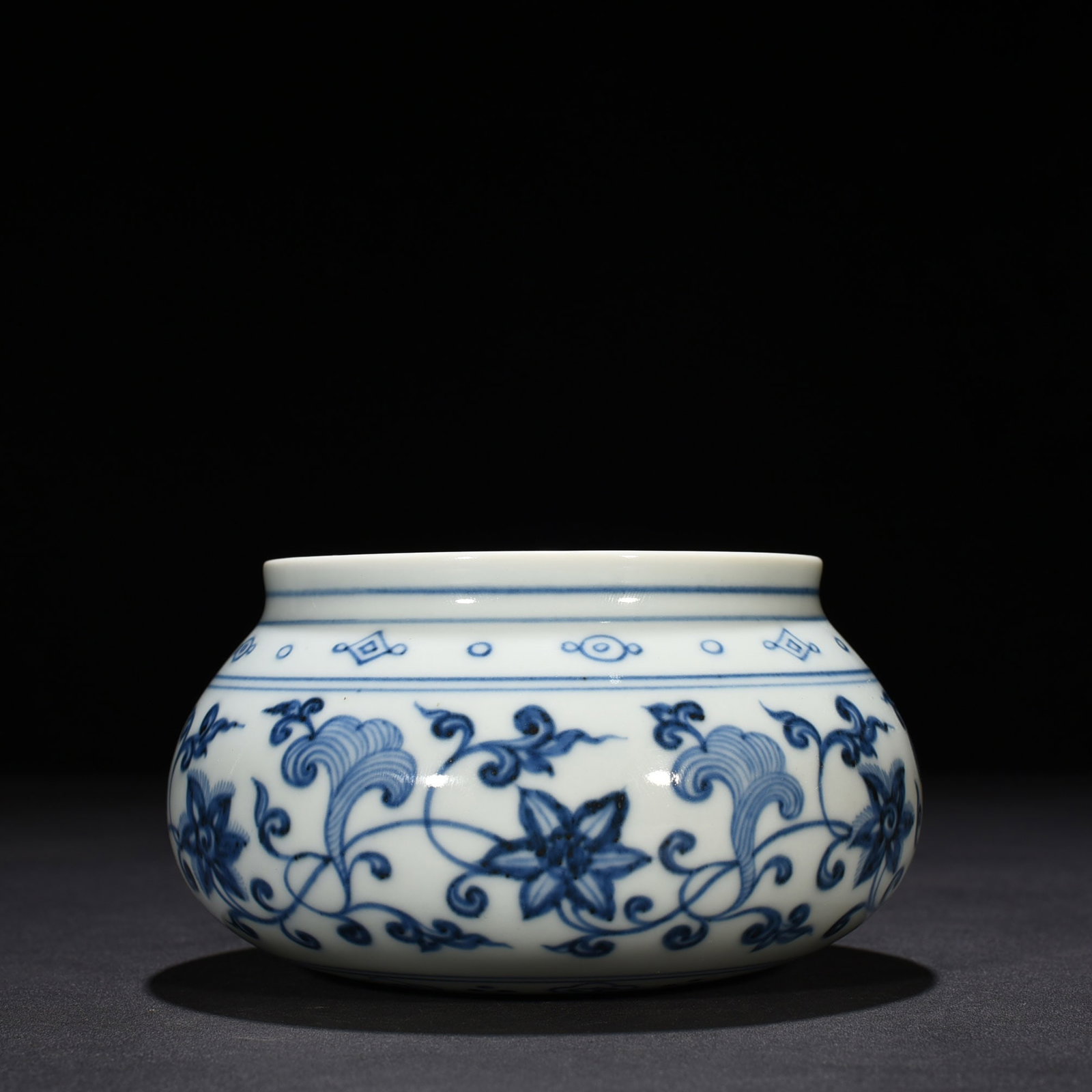 An Exquisite Chinese blueAnd white bowl with floral patterns: Size: Height 8 cm - Widthh 14 cm Materials: Porcelain Dynasty: Ming dynasty Attribution: Xuande Object: bowl