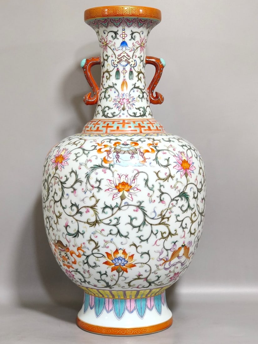 An Exquisite Chinese Yangcai Western Panlian Eight Treasures pattern amphorae: Size: Height 41 cm - Width 21 cm Materials: Porcelain Dynasty: Qing dynasty Inscription: Qianlong Mark Object: amphora