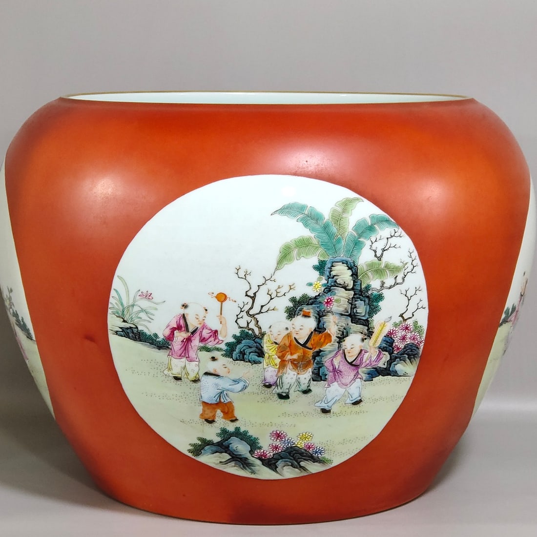 An Exquisite Chinese Coral red apple vat with window showing baby playing: Size: Width 37 cm - Height 28.5 cm Materials: Porcelain Dynasty: Qing dynasty Inscription: Qianlong Mark Object: vat