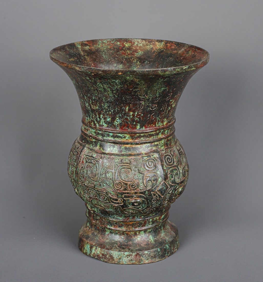 An Exquisite Chinese Bronze Round Zun with Animal Mask Pattern: Size: Height 23 cm - Width 17 cm Materials: Bronze Dynasty: zhou dynasty Attribution: 700-BC Object: Chinese Antiques