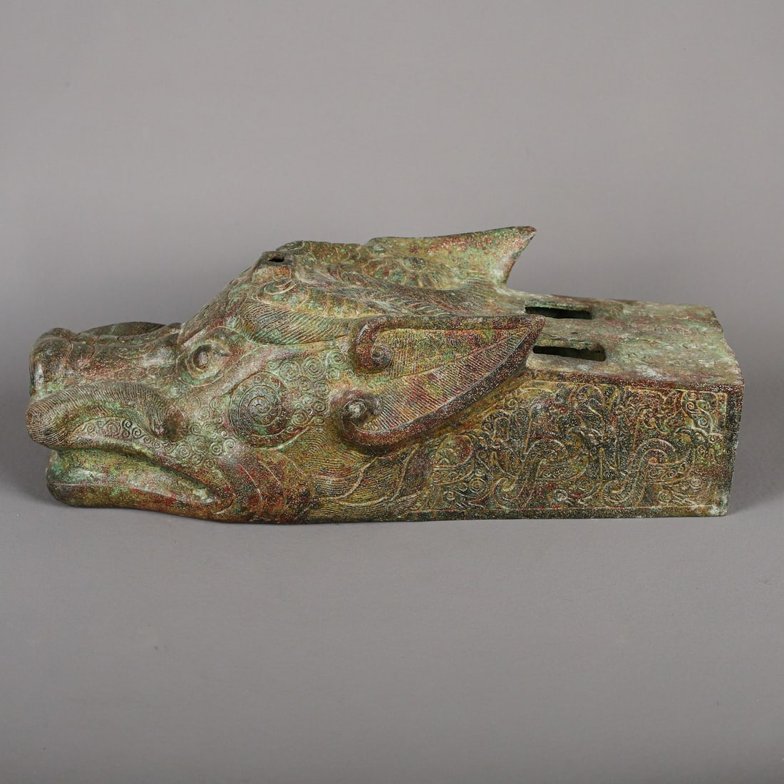 An Exquisite Chinese Bronze dragon head case carriage accessories: Size: Height 9 cm - Width 28 cm Materials: Bronze Dynasty: zhou dynasty Attribution: 700-BC Object: Chinese Antiques