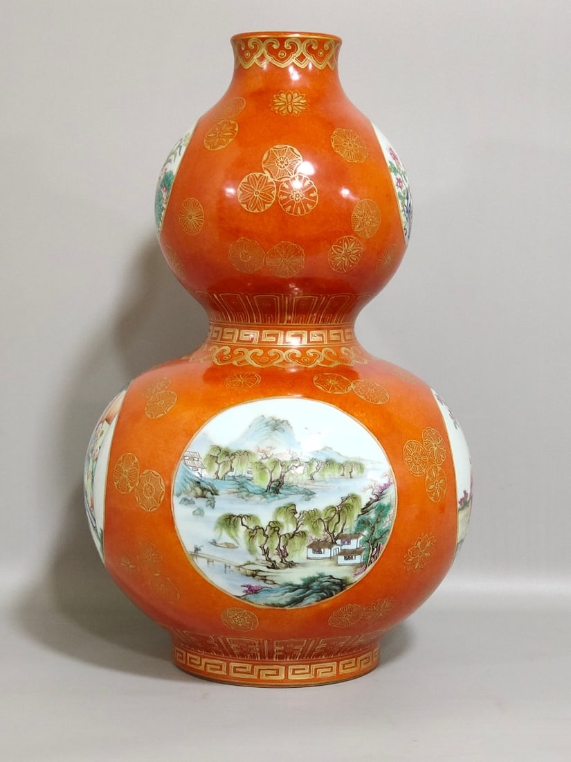 An Exquisite Chinese Coral red gilt gourd vase with window landscapeAnd baby playing: Size: Height 33 cm - Width 18 cm Materials: Porcelain Dynasty: Qing dynasty Inscription: Qianlong Mark Object: vase