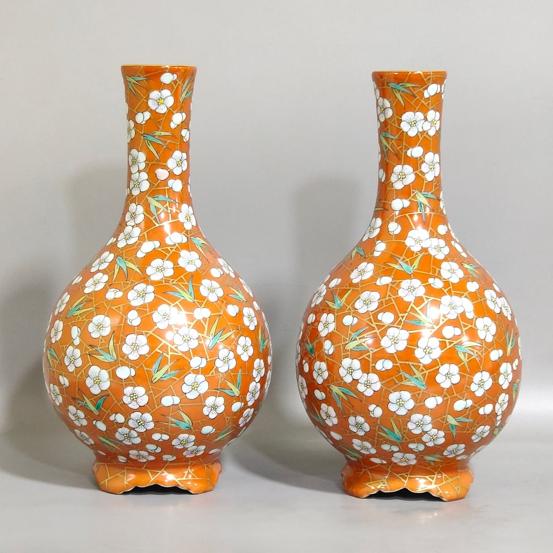 An Exquisite Chinese Coral red plum blossomAnd bamboo leaf vase: Size: Height 19.9 cm - Width 10.5 cm Materials: Porcelain Dynasty: Qing dynasty Inscription: Qianlong Mark Object: vase