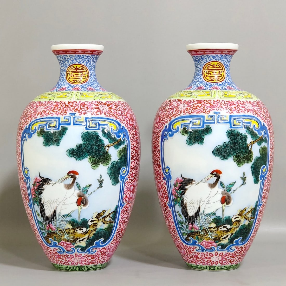 An Exquisite Chinese enamel pine crane golden pheasantAnd plum vase: Size: Height 20.5 cm - Width 11 cm Materials: Porcelain Dynasty: Qing dynasty Inscription: Qianlong Mark Object: vase