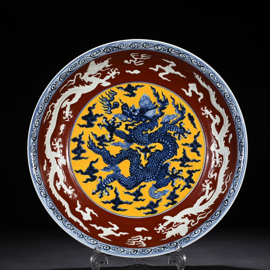 An Exquisite Chinese yellow ground blue and white dragon pattern plate: Size: Height 6.5 cm - Widthh 40 cm Materials: Porcelain Dynasty: Ming dynasty Attribution: Xuande Object: plate