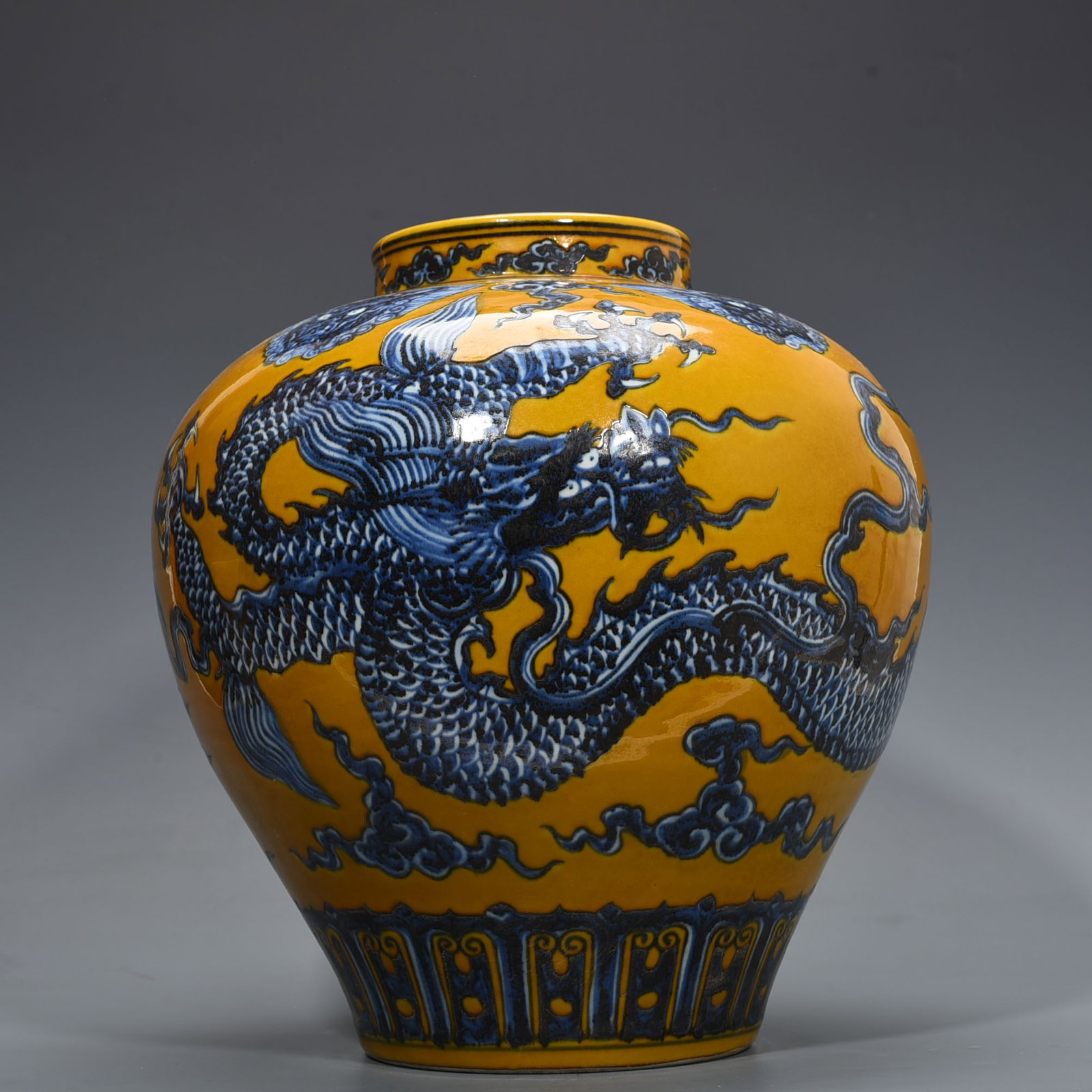 An Exquisite Chinese yellow ground blue and white dragon pattern jar: Size: Height 37 cm - Widthh 32 cm Materials: Porcelain Dynasty: Ming dynasty Attribution: Xuande Object: jar