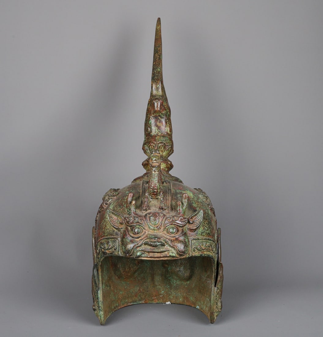 An Exquisite Chinese Bronze Beast Face General Helmet: Size: Height 53 cm - Width 25 cm Materials: Bronze Dynasty: Han dynasty Attribution: 1st to 3rd-C Object: Chinese Antiques