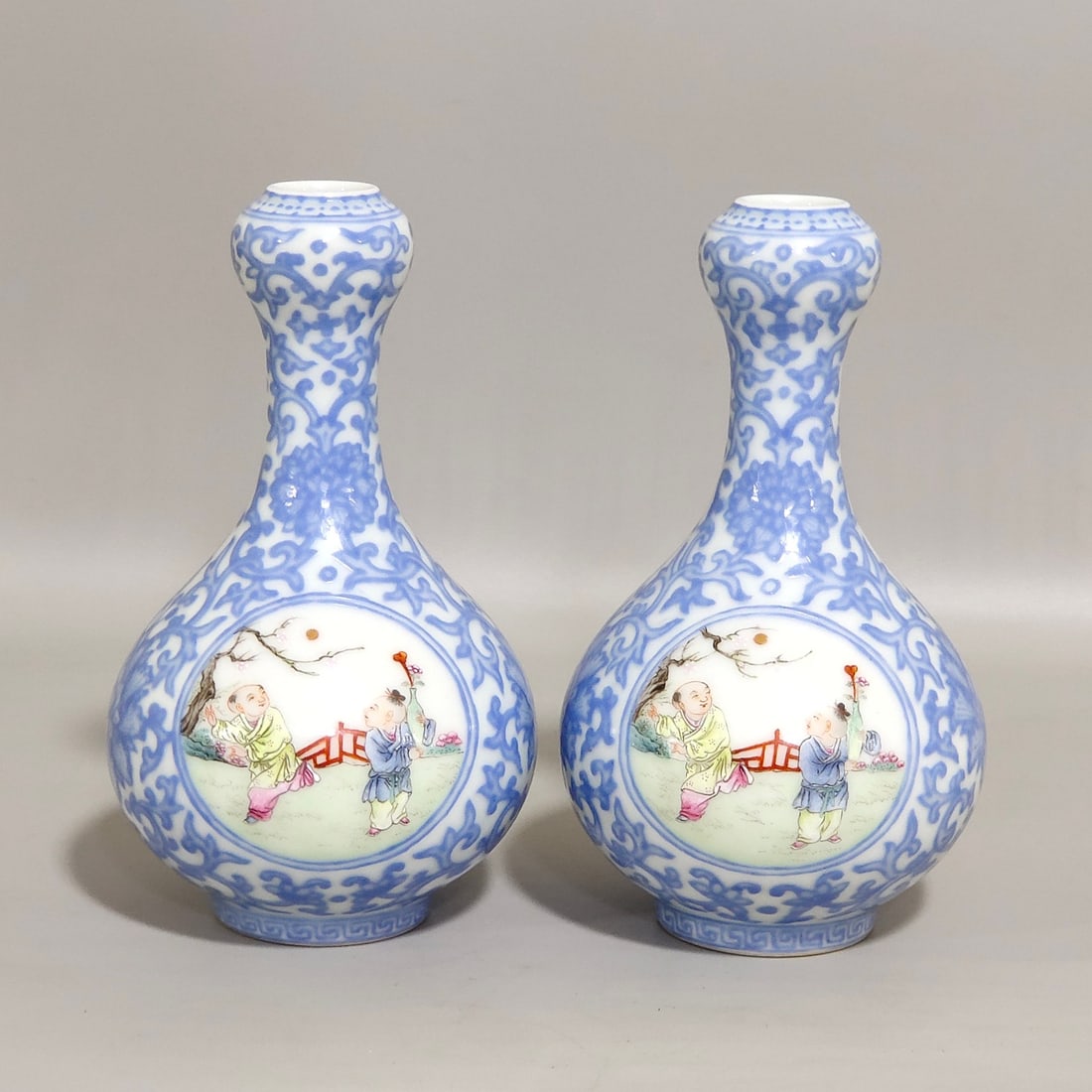 An Exquisite Chinese enamel emerald blue windowed boy's vase: Size: Height 11 cm - Width 6.8 cm Materials: Porcelain Dynasty: Qing dynasty Inscription: Qianlong Mark Object: vase