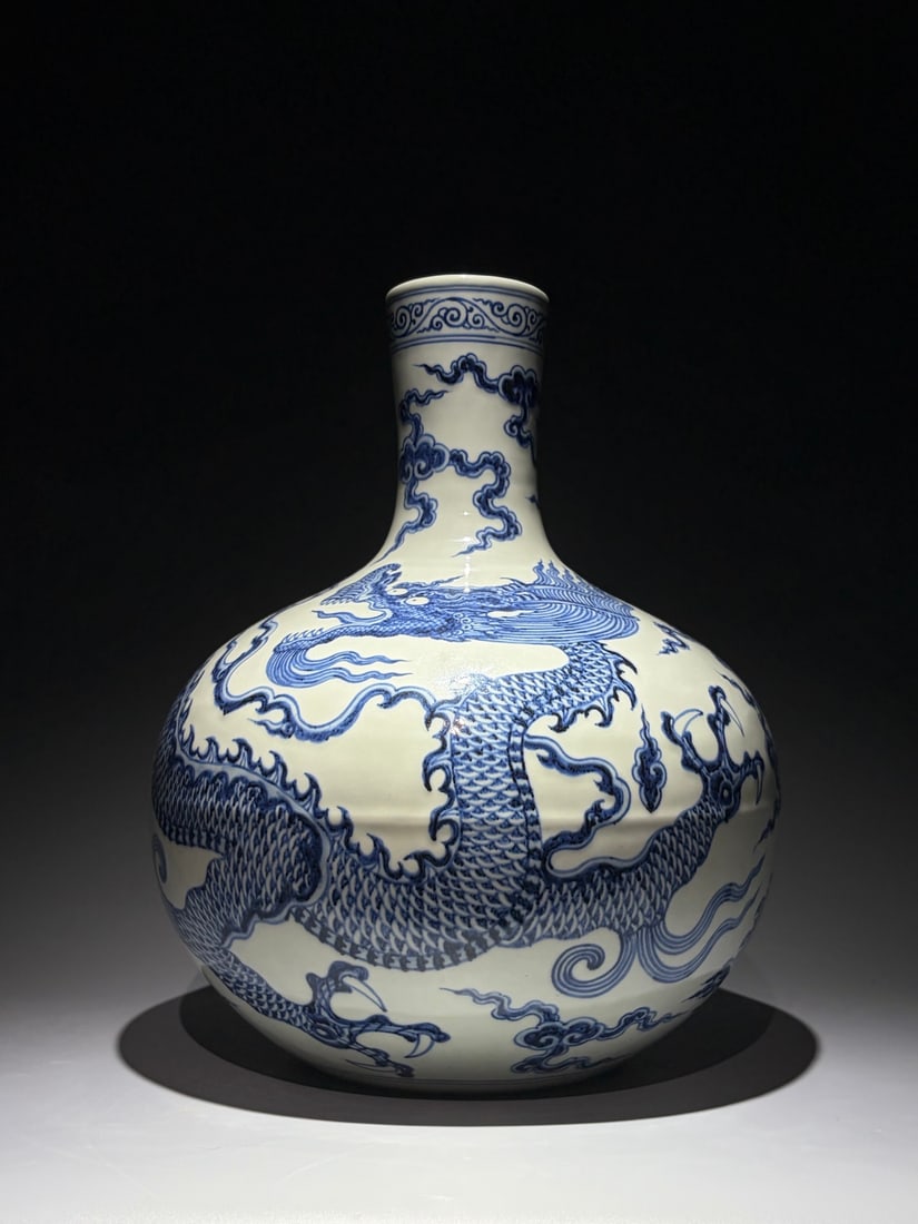 An Exquisite Chinese blue and white cloud and dragon pattern celestial sphere Porcelain vase: Size: Height 38 cm - Width 43 cm Materials: Porcelain Dynasty: Ming dynasty Attribution: Yongle Period Object: Vase