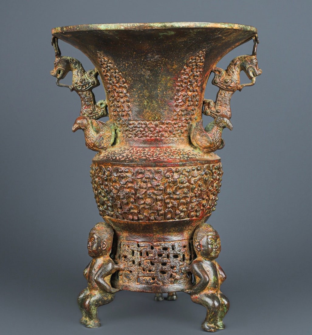 An Exquisite Chinese Bronze Double Dragon Circle Zun: Size: Height 33.5 cm - Width 23.5 cm Materials: Bronze Dynasty: zhou dynasty Attribution: 700-BC Object: Chinese Antiques