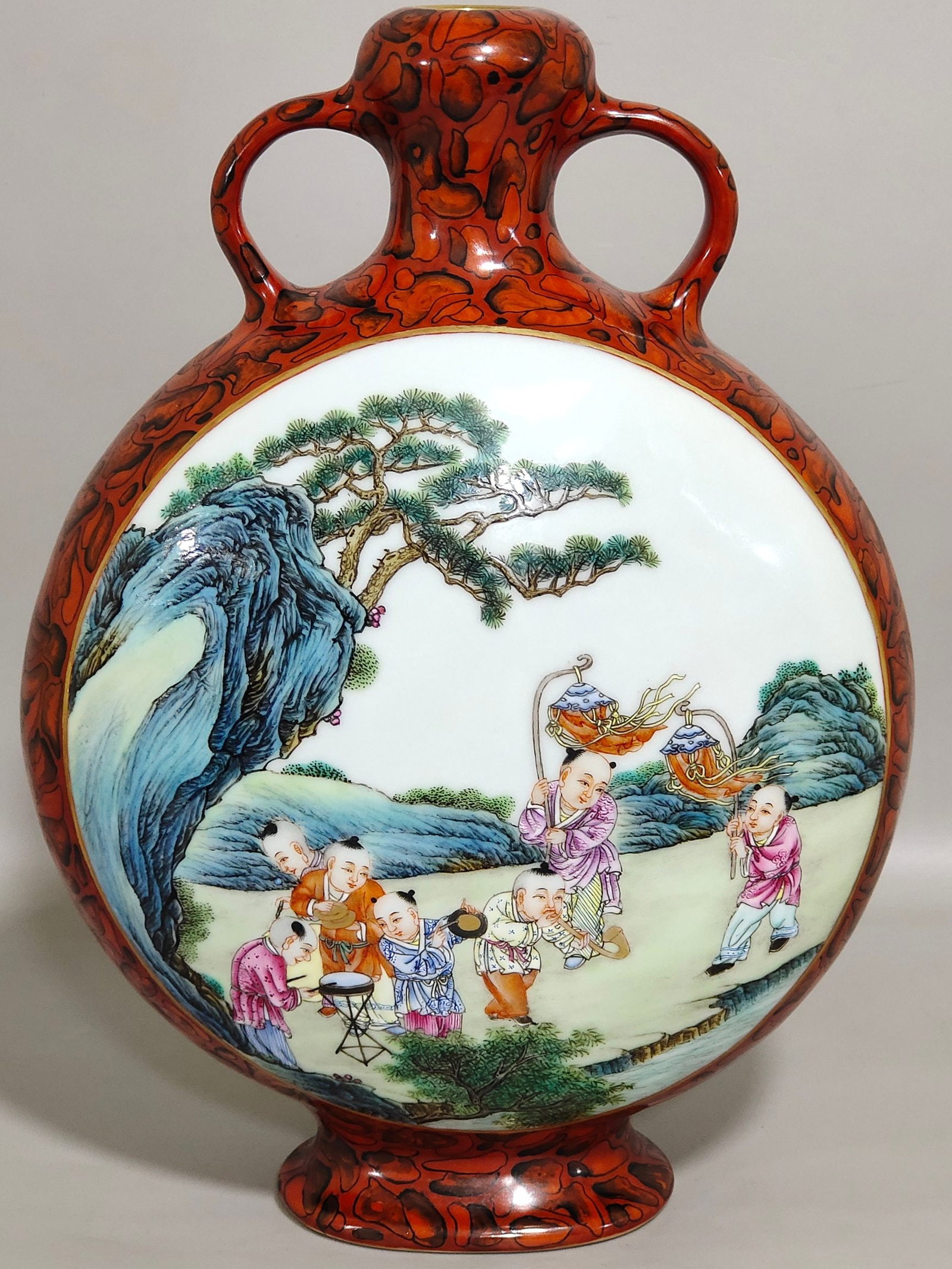 An Exquisite Chinese stone patterned glazed window vase with baby playing and holding the moon: Size: Height 23.8 cm - Width 16.8 cm Materials: Porcelain Dynasty: Qing dynasty Inscription: Qianlong Mark Object: vase