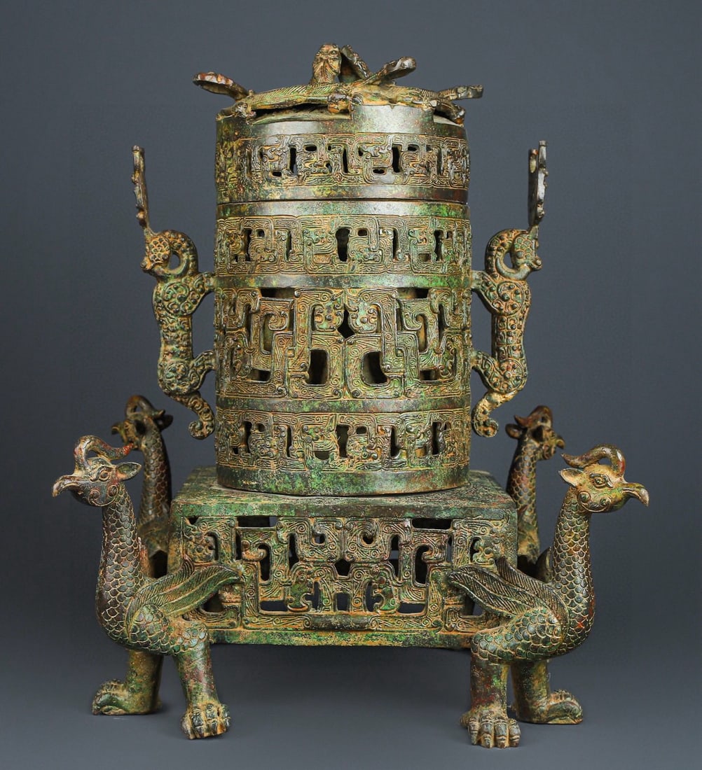 An Exquisite Chinese Bronze hollow dragon and phoenix smoke: Size: Height 44 cm - Width 35 cm Materials: Bronze Dynasty: Han dynasty Attribution: 1st to 3rd-C Object: Chinese Antiques