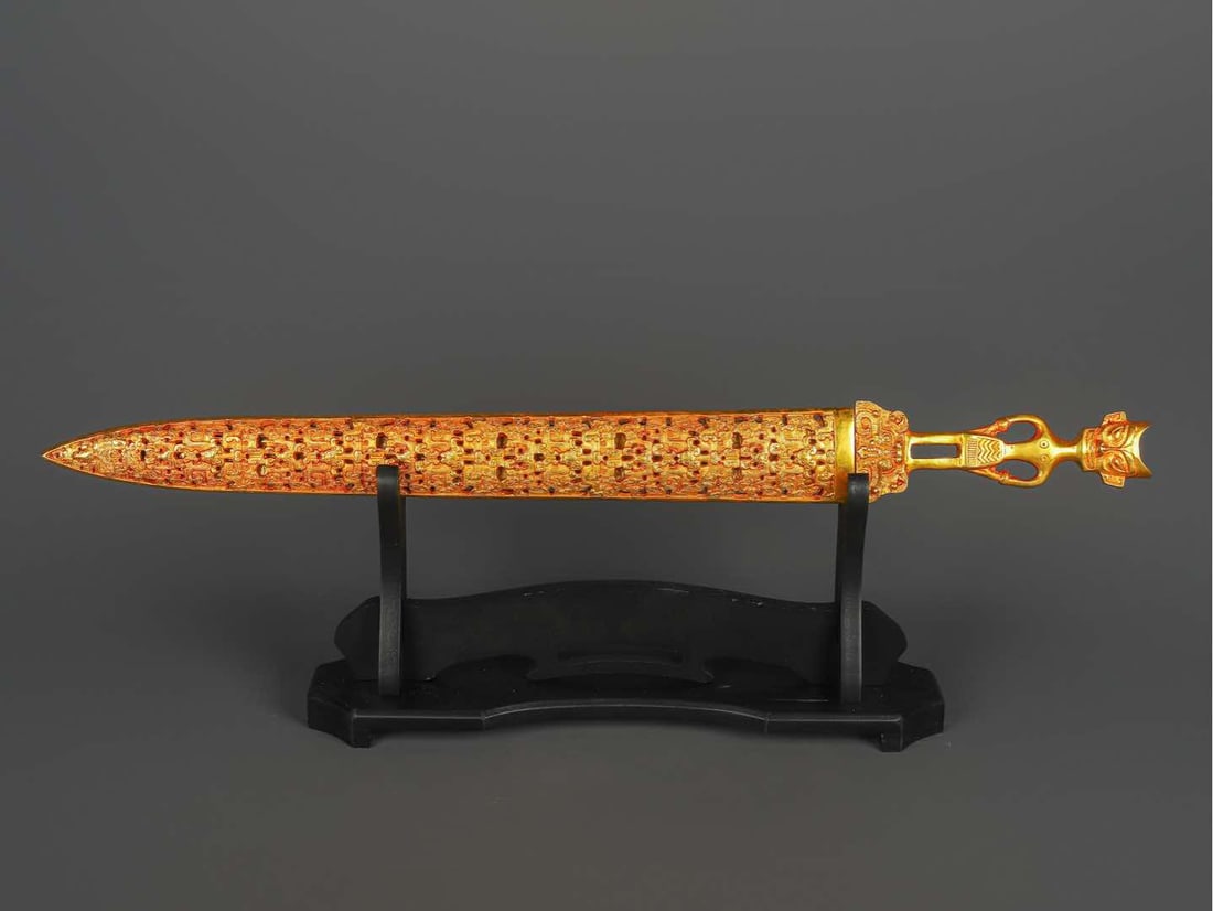 An Exquisite Chinese Bronze gilt real gold scabbard sword: Size: Height 66 cm - Width 7 cm Materials: Bronze Dynasty: Han dynasty Attribution: 1st to 3rd-C Object: Chinese Antiques