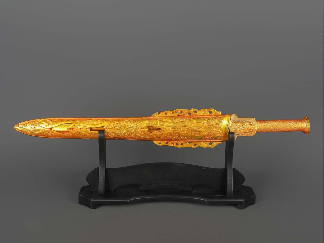 An Exquisite Chinese Bronze gilt real gold scabbard sword: Size: Height 64 cm - Width 9 cm Materials: Bronze Dynasty: Han dynasty Attribution: 1st to 3rd-C Object: Chinese Antiques