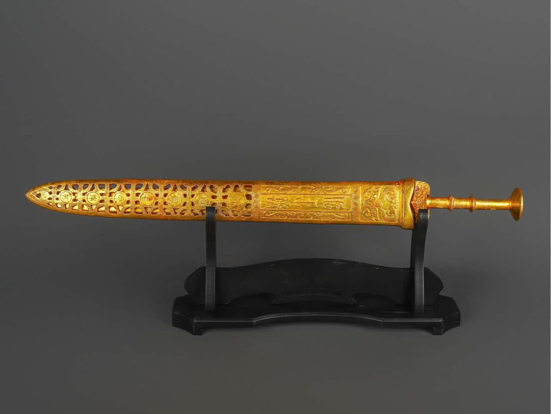 An Exquisite Chinese Bronze gilt real gold scabbard sword: Size: Height 65 cm - Width 7 cm Materials: Bronze Dynasty: Han dynasty Attribution: 1st to 3rd-C Object: Chinese Antiques