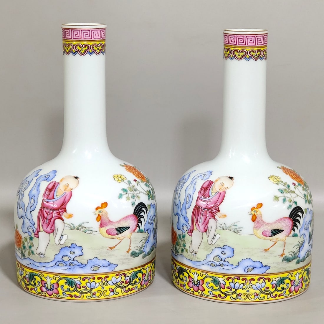 An Exquisite Chinese boy's cockfighting poem and ringing bell statue: Size: Height 18.7 cm - Width 10.2 cm Materials: Porcelain Dynasty: Qing dynasty Inscription: Qianlong Mark Object: vase