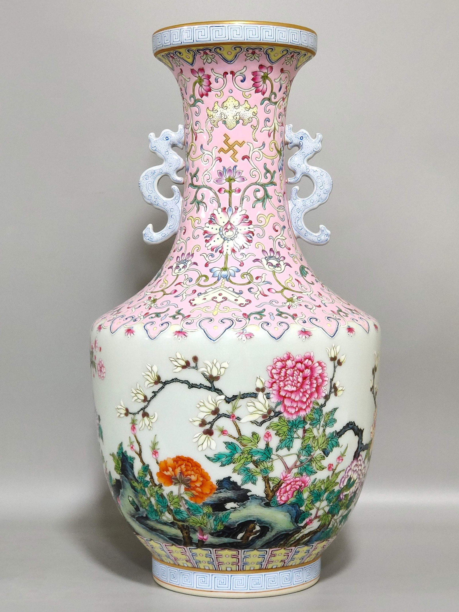 An Exquisite Chinese A pink peony and magnolia amphorae: Size: Height 33 cm - Width 18 cm Materials: Porcelain Dynasty: Qing dynasty Inscription: Qianlong Mark Object: amphora