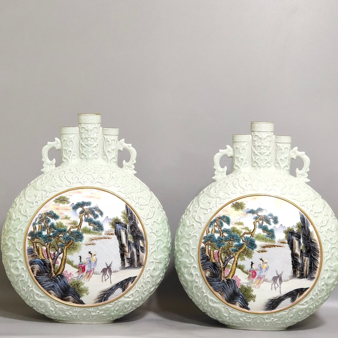 An Exquisite Chinese pink green glaze carving window character story three tube moon holding vase: Size: Height 31 cm - Width 24.5 cm Materials: Porcelain Dynasty: Qing dynasty Inscription: Qianlong Mark Object: vase