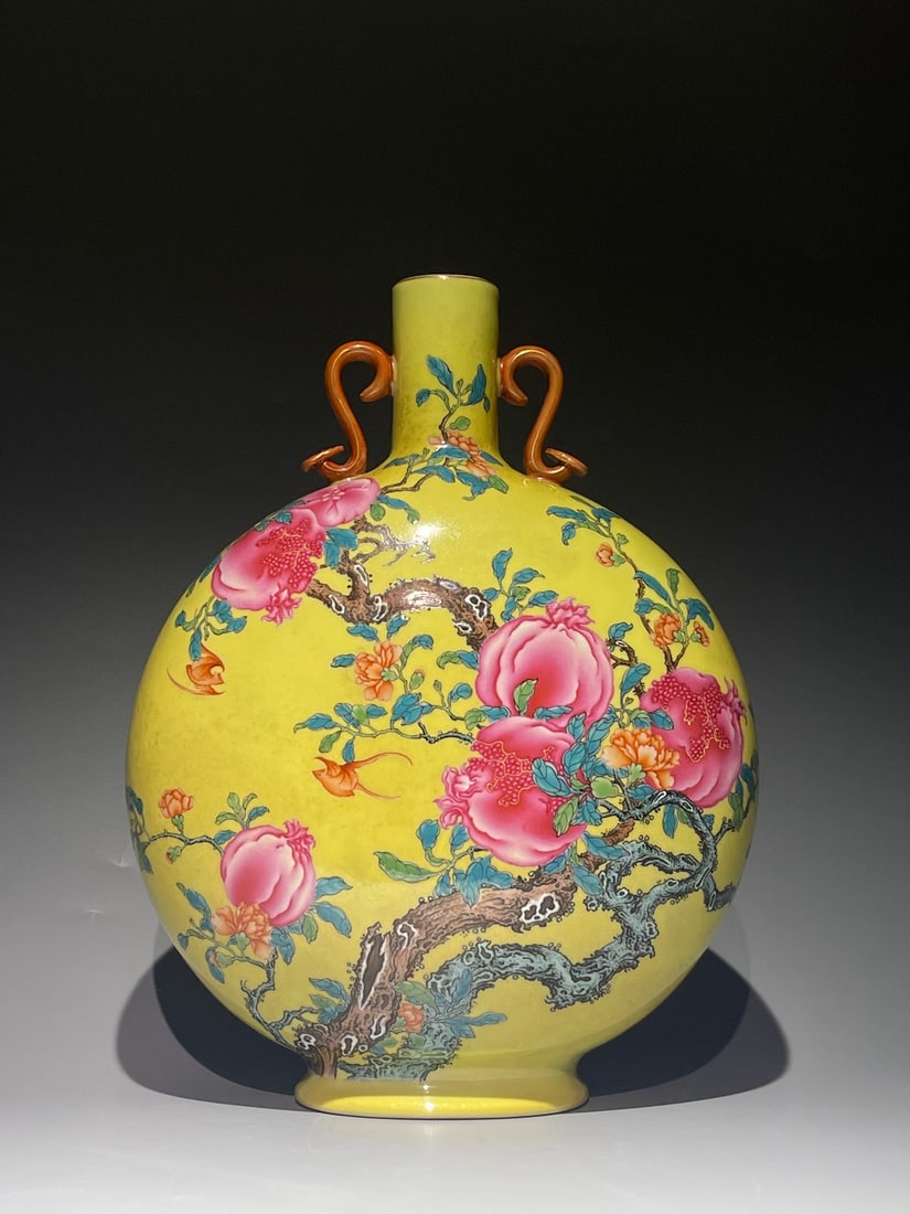 An Exquisite Chinese yellow ground pastel Ruyi ear holding the moon Porcelain vase: Size: Height 33.8 cm - Width 26 cm Materials: Porcelain Dynasty: Qing dynasty Attribution: Qianlong Period Object: vase