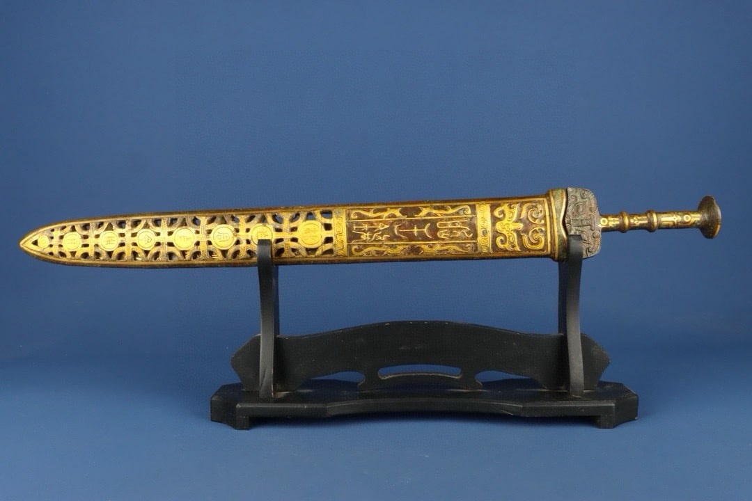 An Exquisite Chinese Bronze and gold inscribed sword: Size: Height 65 cm - Width 7 cm Materials: Bronze Dynasty: Han dynasty Attribution: 1st to 3rd-C Object: Chinese Antiques